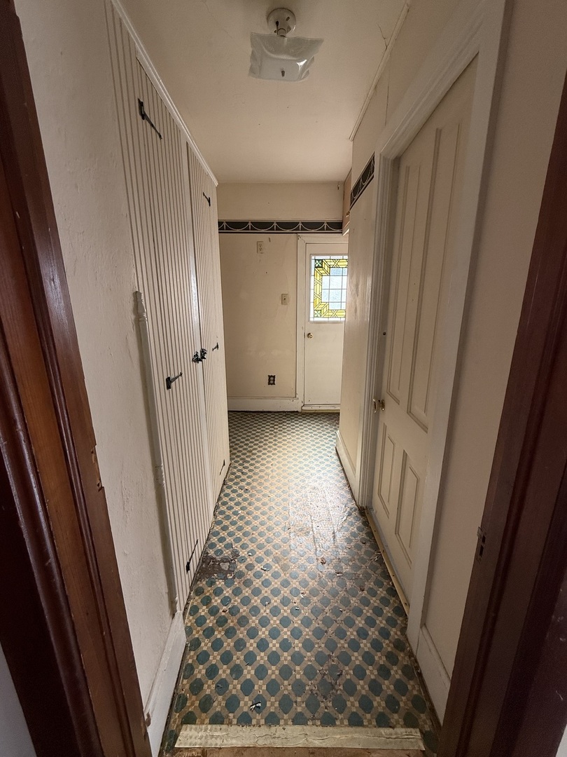412 West Elm Street Sycamore, IL 60178 - Photo 25 of 35 a view of hallway with window and stairs