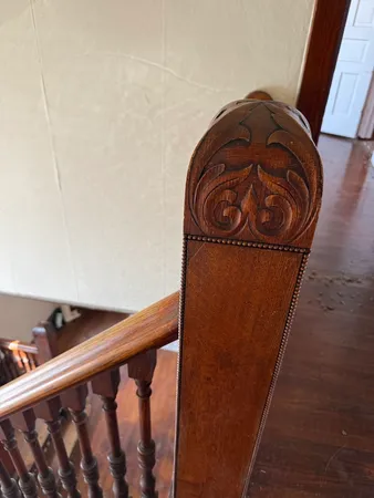 a view of front door with chair and stairs