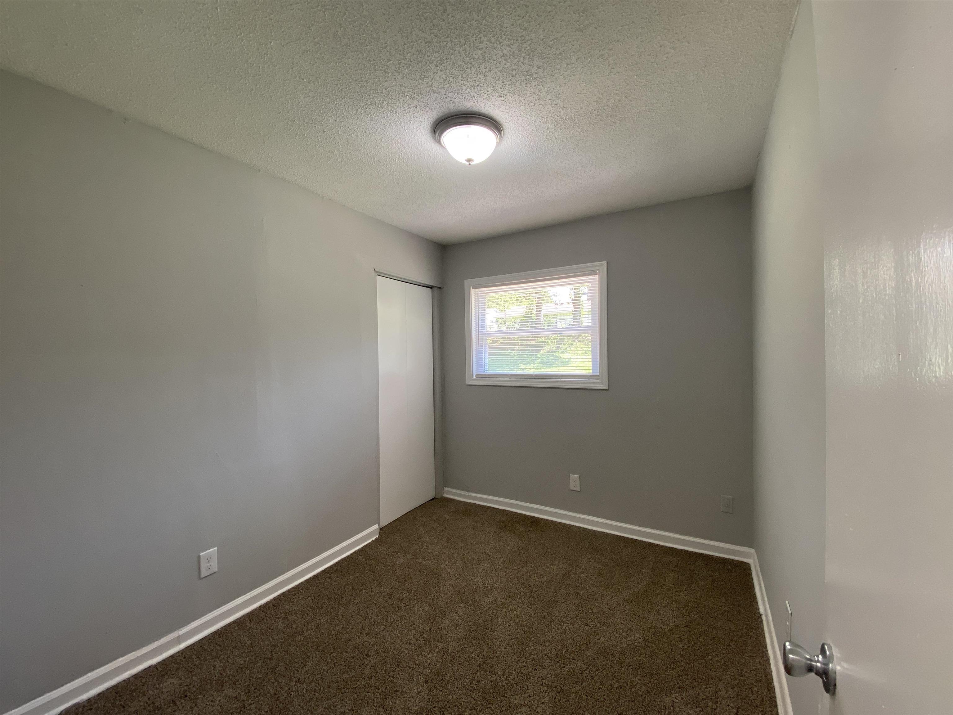 667 West Raines Road Memphis, TN 38109 - Photo 14 of 15 an empty room with a window