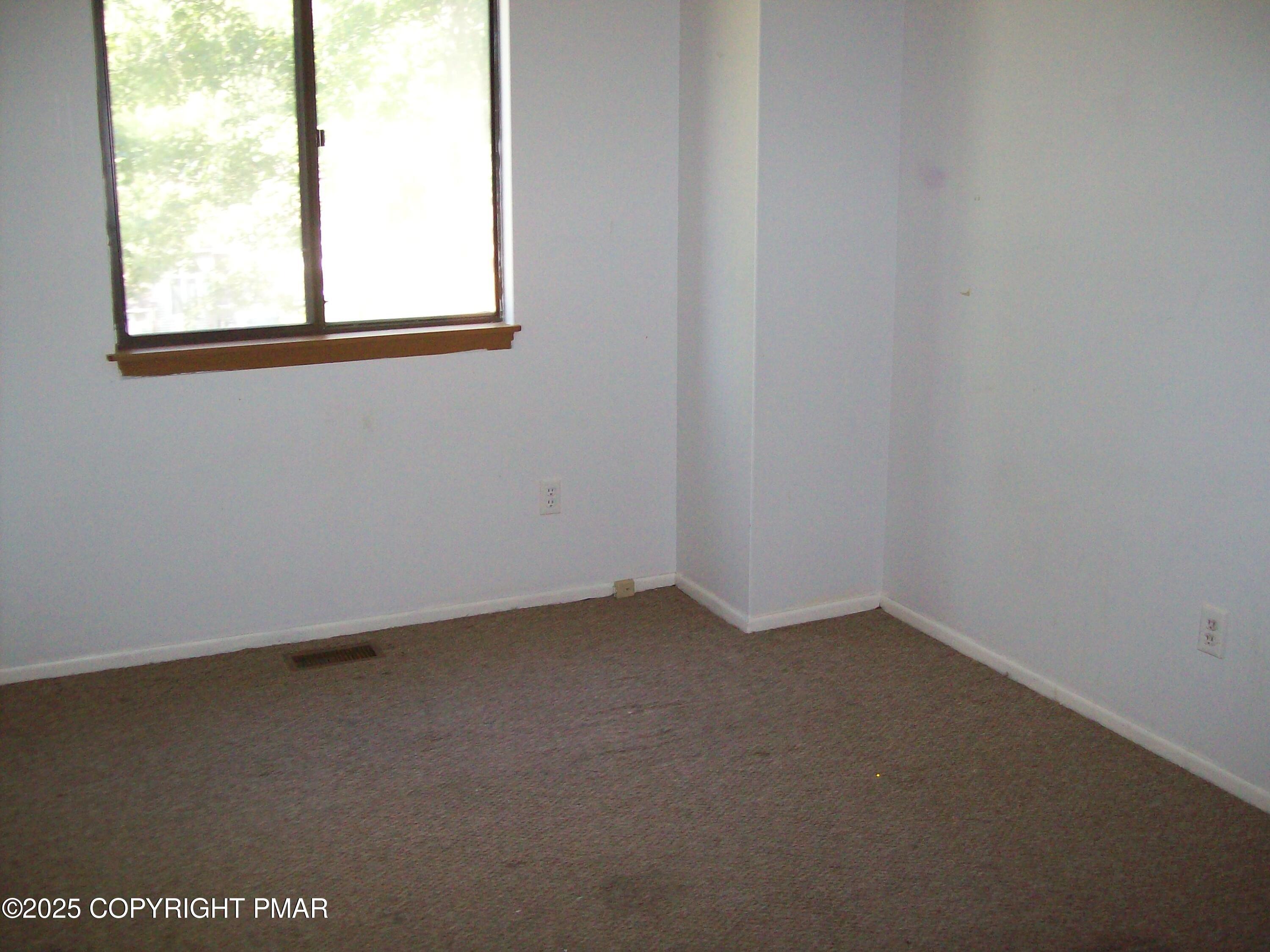 3314 Windermere Drive Bushkill, PA 18324 - Photo 14 of 23 an empty room with a window