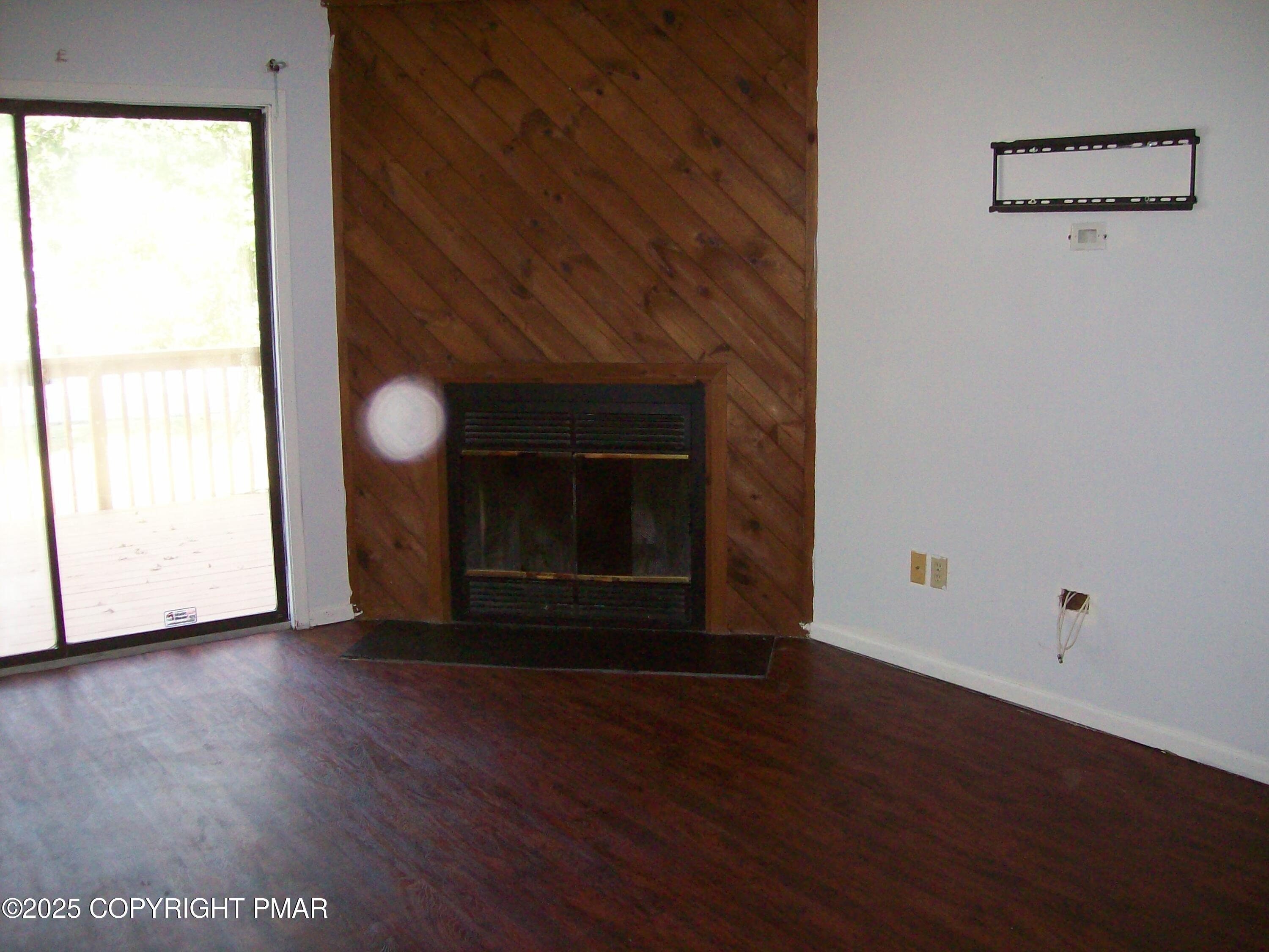 3314 Windermere Drive Bushkill, PA 18324 - Photo 7 of 23 a view of empty room with wooden floor and fan