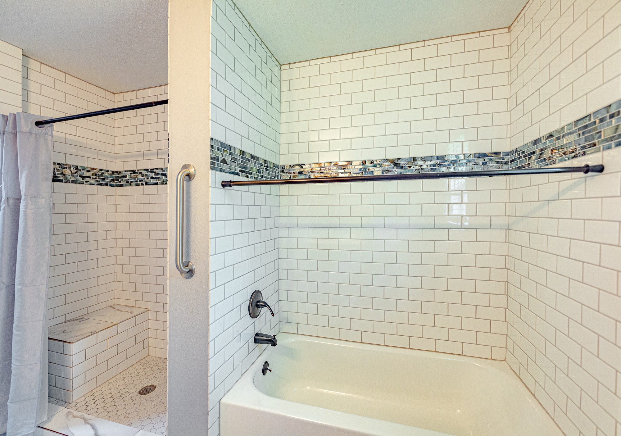 421 West Runk Street Shiner, TX 77984 - Photo 11 of 18 a bathroom with a bathtub and shower