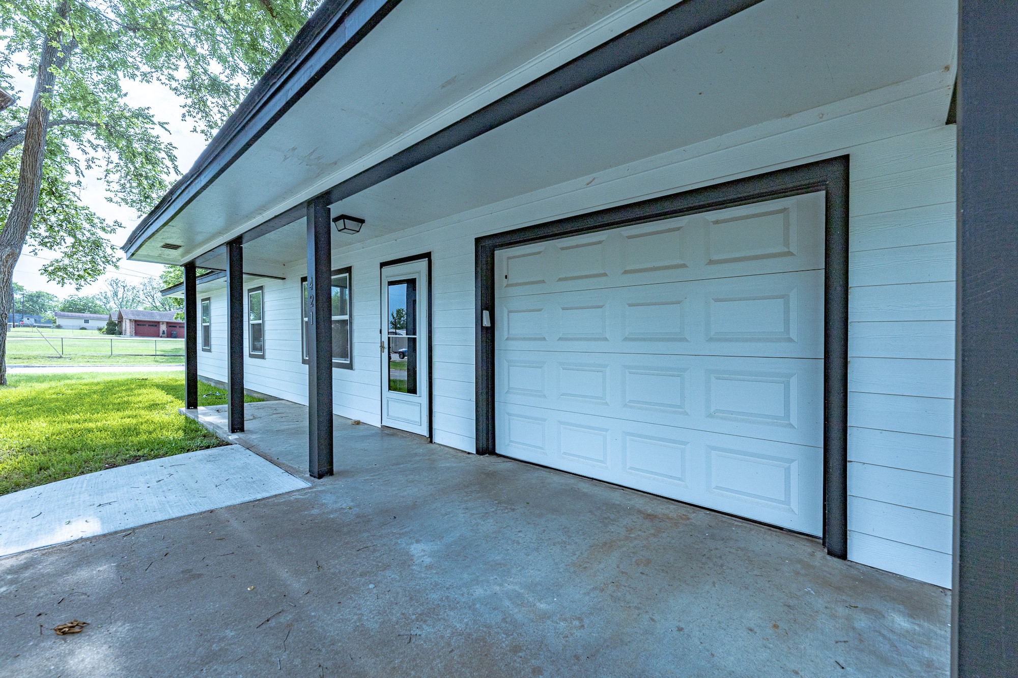 421 West Runk Street Shiner, TX 77984 - Photo 3 of 18 a view of an entrance to house with yard