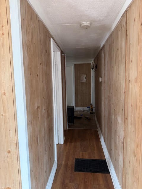15110 Firetower Road Conroe, TX 77306 - Photo 9 of 14 a view of a hallway with wooden floor and staircase