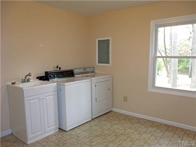 4509 Waterbury Road Raleigh, NC 27604 - Photo 10 of 13 a utility room with dryer and washer