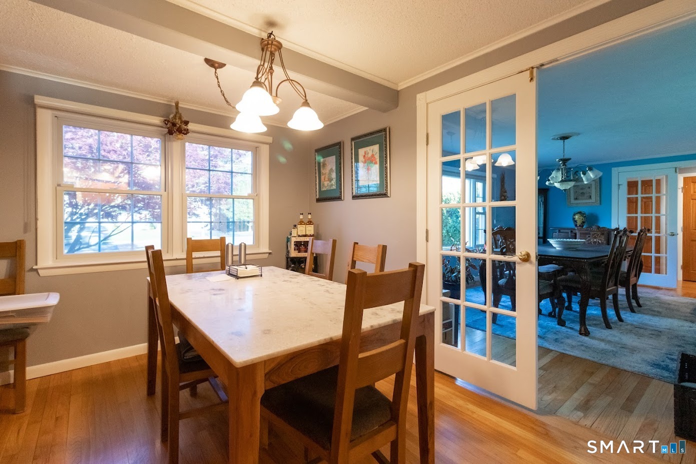 763 North Street Suffield, CT 06078 - Photo 6 of 40 a view of a dining room with furniture window and wooden floor