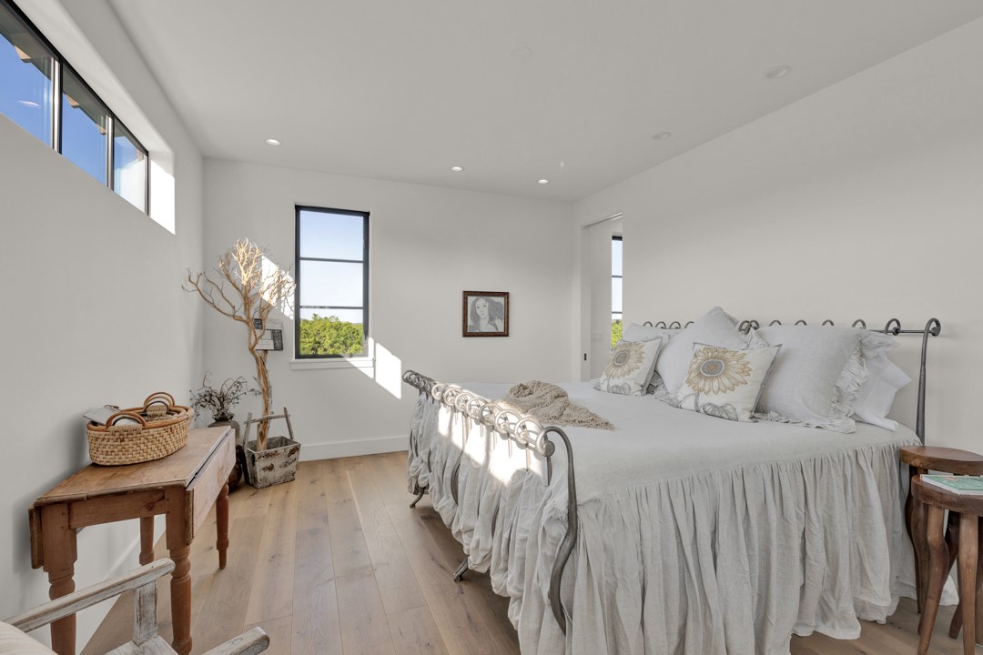 5862 Ranch Road 965 Llano, TX 78643 - Photo 23 of 40 a bedroom with bed and a dresser