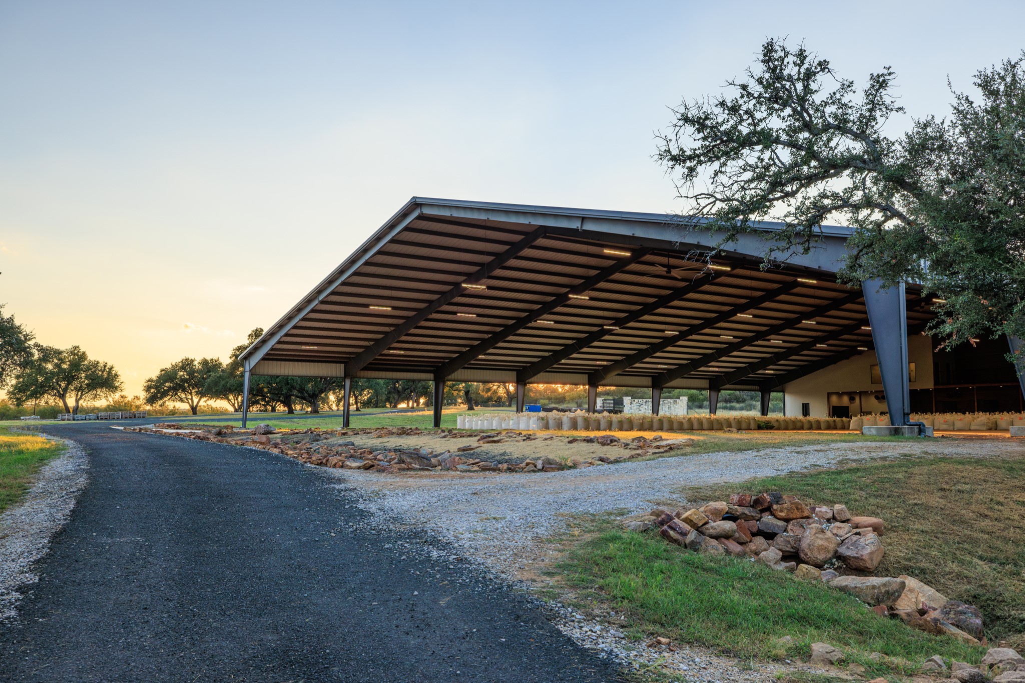 5862 Ranch Road 965 Llano, TX 78643 - Photo 5 of 40 a view of a big yard with table and chairs under an umbrella