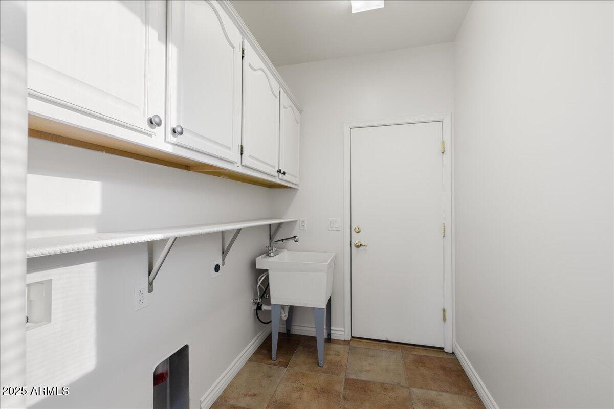 970 South Golf View Drive Cornville, AZ 86325 - Photo 45 of 48 a view of storage and utility room with racks on the wall