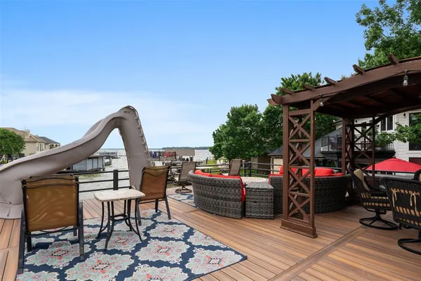 a view of a terrace with sitting area