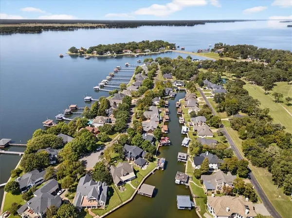 a view of a swimming pool with an outdoor seating
