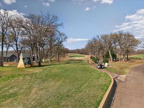 a view of a swimming pool with an ocean view