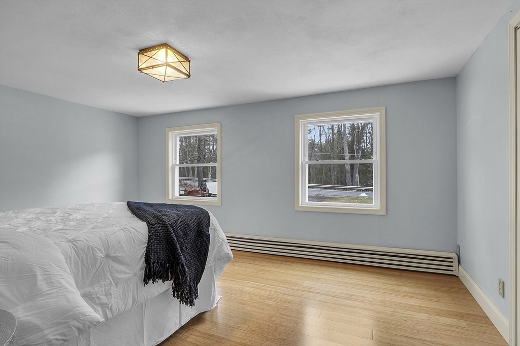 816 Patriots Road Templeton, MA 01468 - Photo 16 of 34 a bedroom with a bed and a window