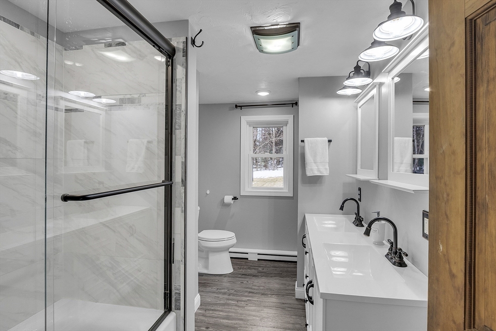 816 Patriots Road Templeton, MA 01468 - Photo 17 of 34 a bathroom with a sink toilet and shower