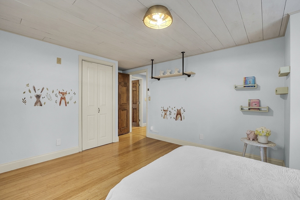 816 Patriots Road Templeton, MA 01468 - Photo 20 of 34 a bedroom with a bed and a window