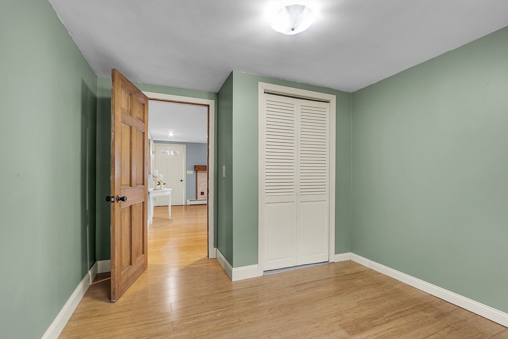 816 Patriots Road Templeton, MA 01468 - Photo 22 of 34 a view of a hallway with wooden floor