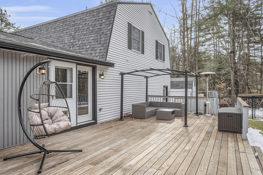816 Patriots Road Templeton, MA 01468 - Photo 24 of 34 a view of a house with wooden deck
