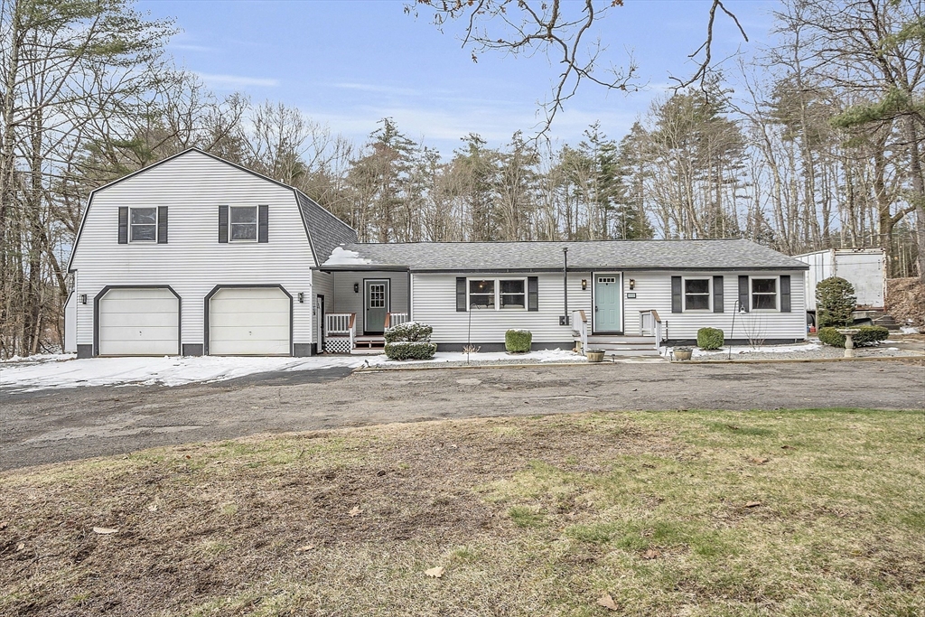 816 Patriots Road Templeton, MA 01468 - Photo 26 of 34 a front view of a house with a yard
