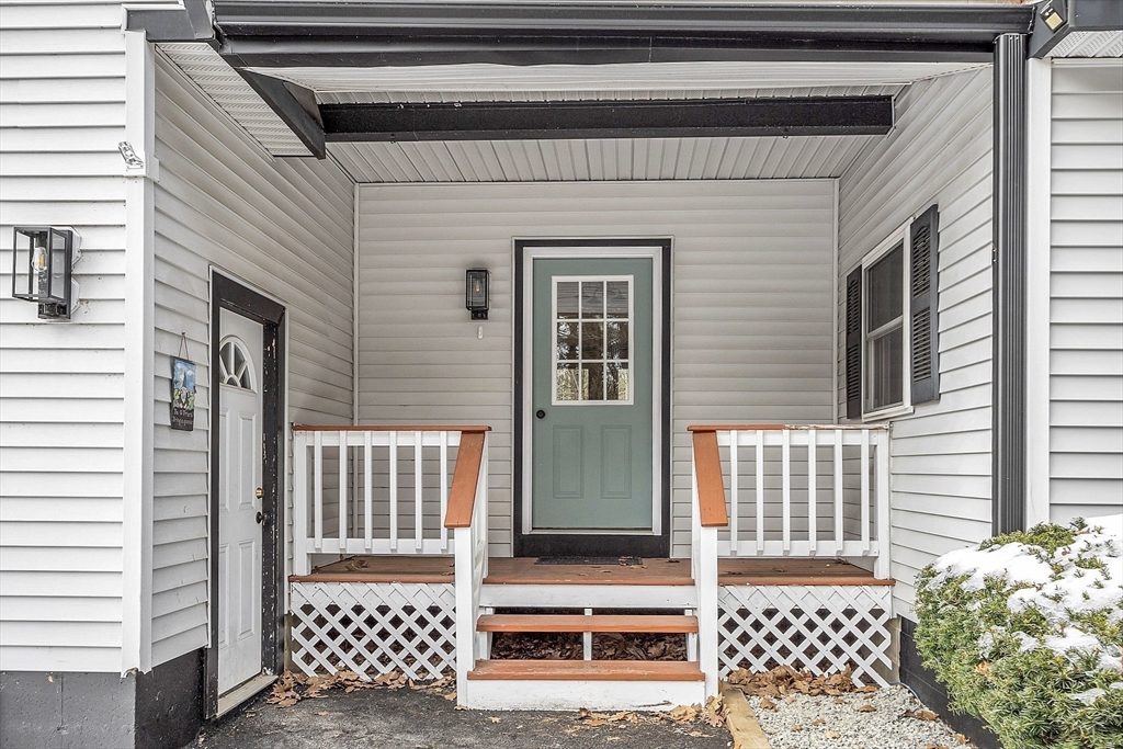 816 Patriots Road Templeton, MA 01468 - Photo 27 of 34 a view of a wooden door and a balcony