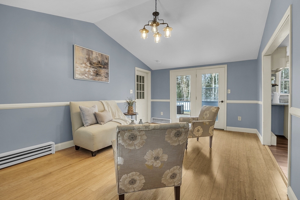 816 Patriots Road Templeton, MA 01468 - Photo 5 of 34 a living room with furniture and large windows