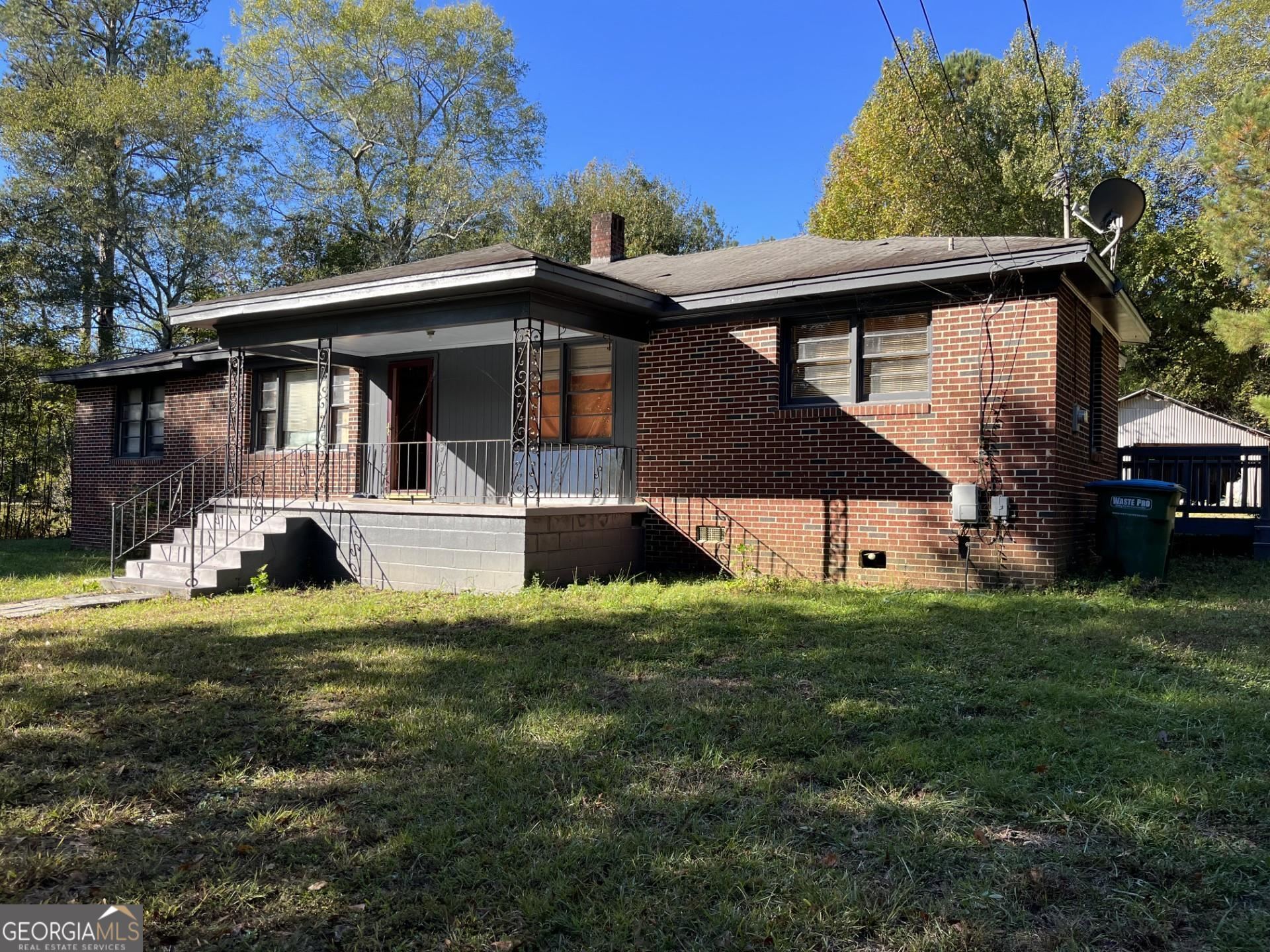 411 North 4th Street Colbert, GA 30628 - Photo 1 of 1 a view of a house with a yard