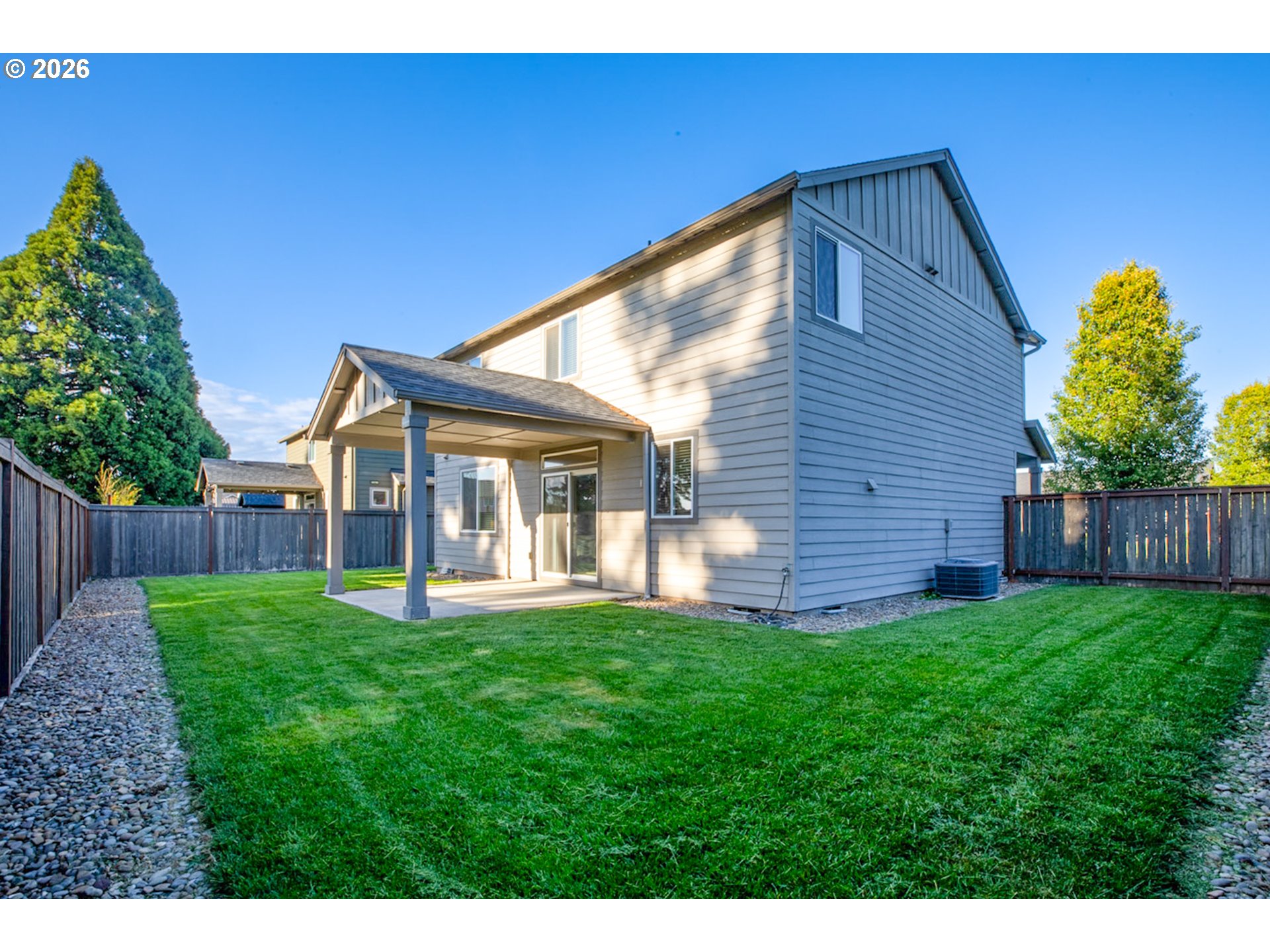 2952 Shelby Way Eugene, OR 97404 - Photo 24 of 25 a view of a house with a yard and sitting area