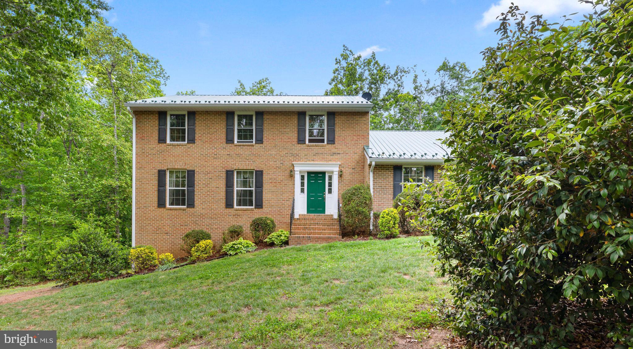 5099 Courtneys Corner Road Sumerduck, VA 22742 - Photo 3 of 52 a front view of a house with garden