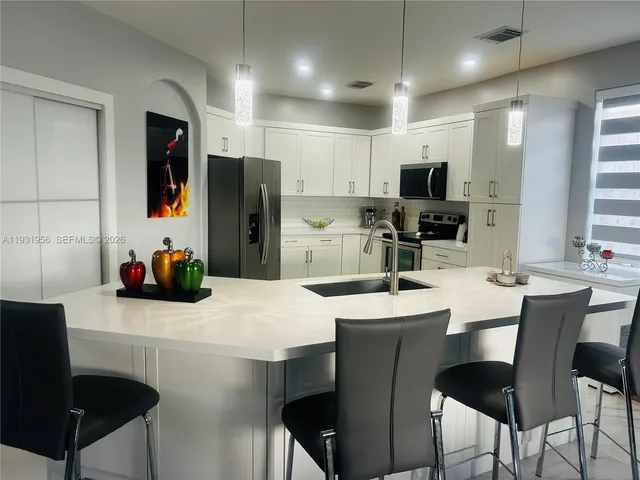 $1,199,000 | 13995 Southwest 154th Street, Miami, FL 33177