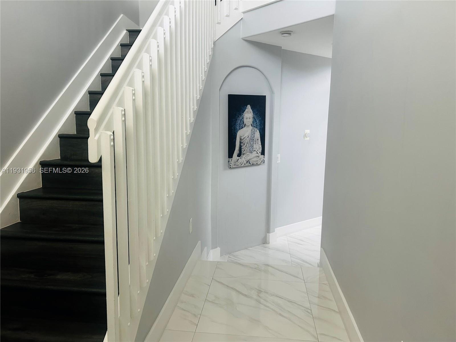 13995 Southwest 154th Street Miami, FL 33177 - Photo 5 of 27 a view of an entryway with hallway