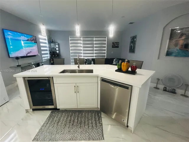 a utility room with washer and dryer