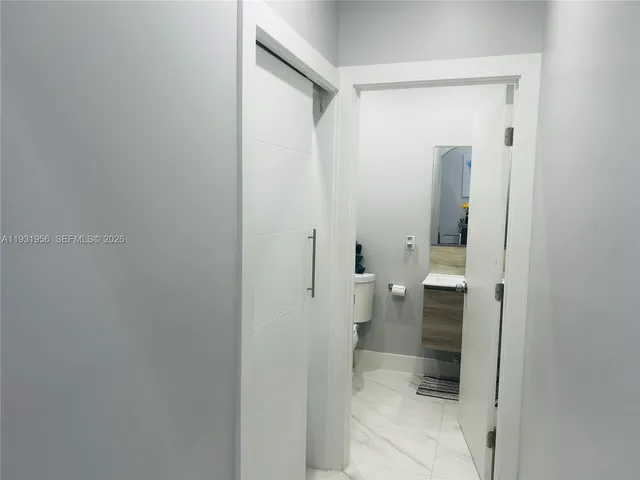 a view of a bathroom from a bathroom