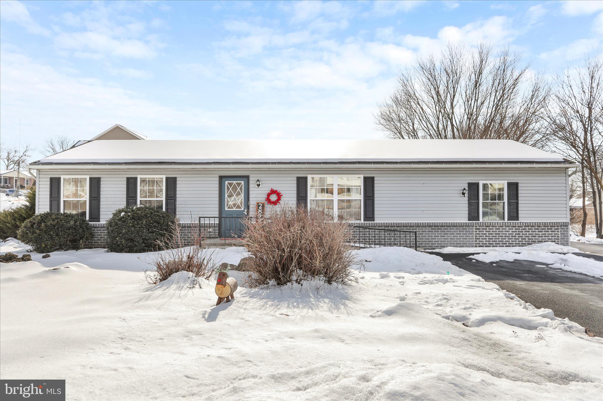 2828 Falling Spring Road Chambersburg, PA 17202 - Photo 1 of 26 a front view of a house with a yard