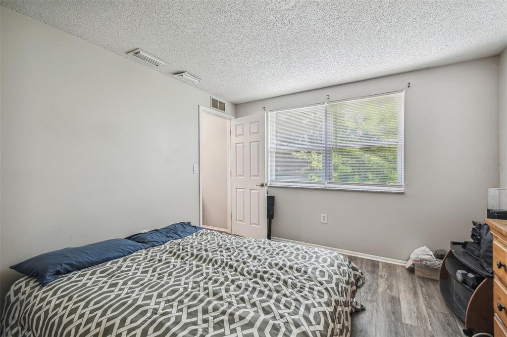 8710 St Regis Lane Port Richey, FL 34668 - Photo 17 of 39 Primary Bedroom
