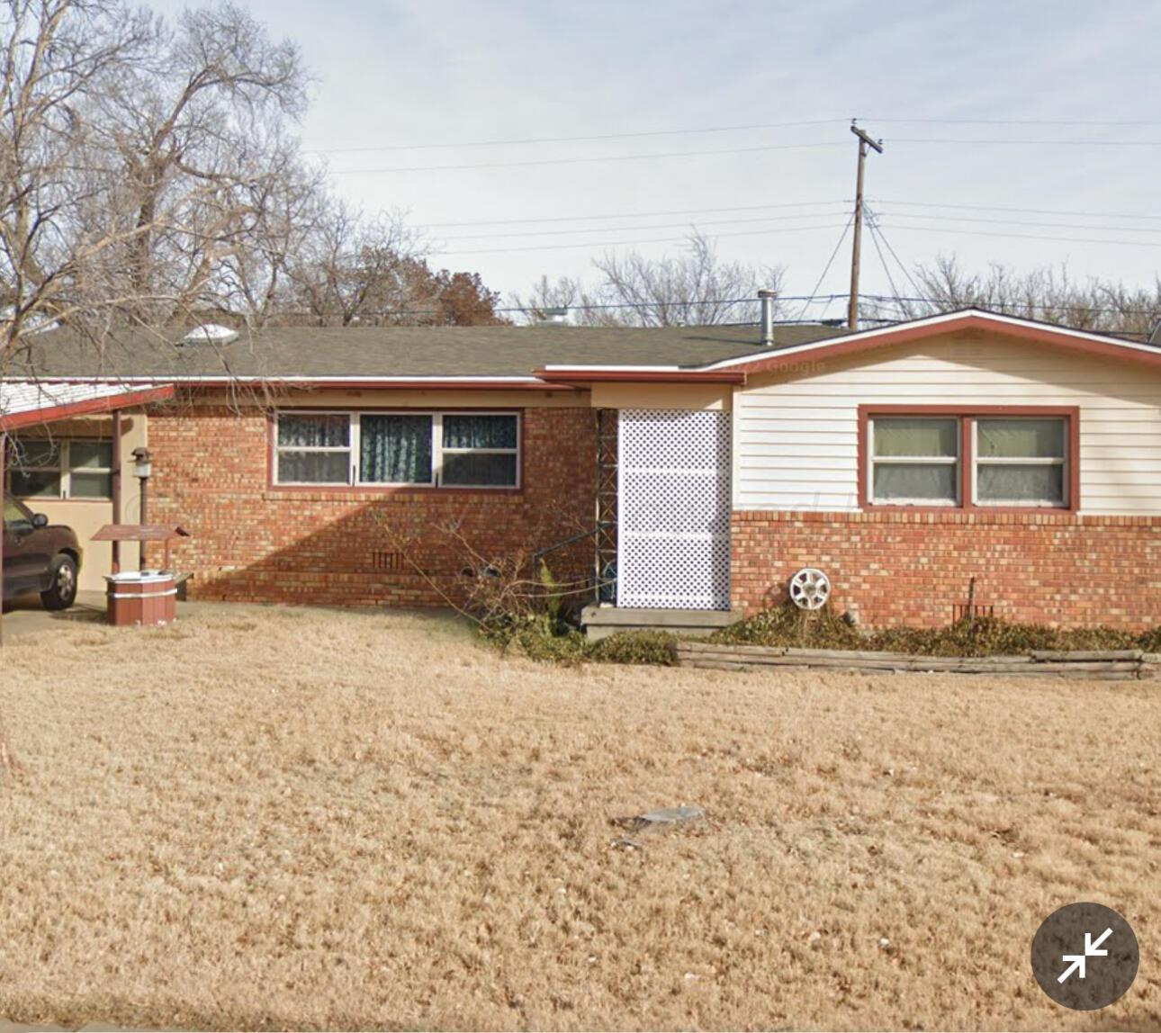 1807 Plateau Lane Amarillo, TX 79106 - Photo 1 of 1 a front view of a house with a yard