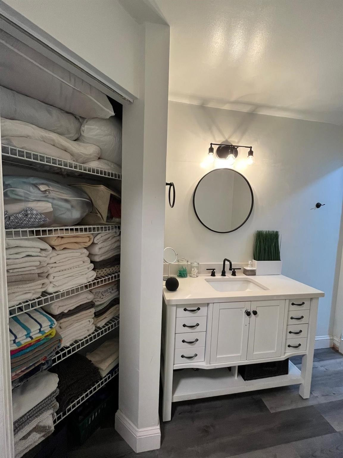 20780 Boca Ridge Drive North, Unit 20780 Boca Raton, FL 33428 - Photo 12 of 35 a bathroom with a sink a mirror and a toilet
