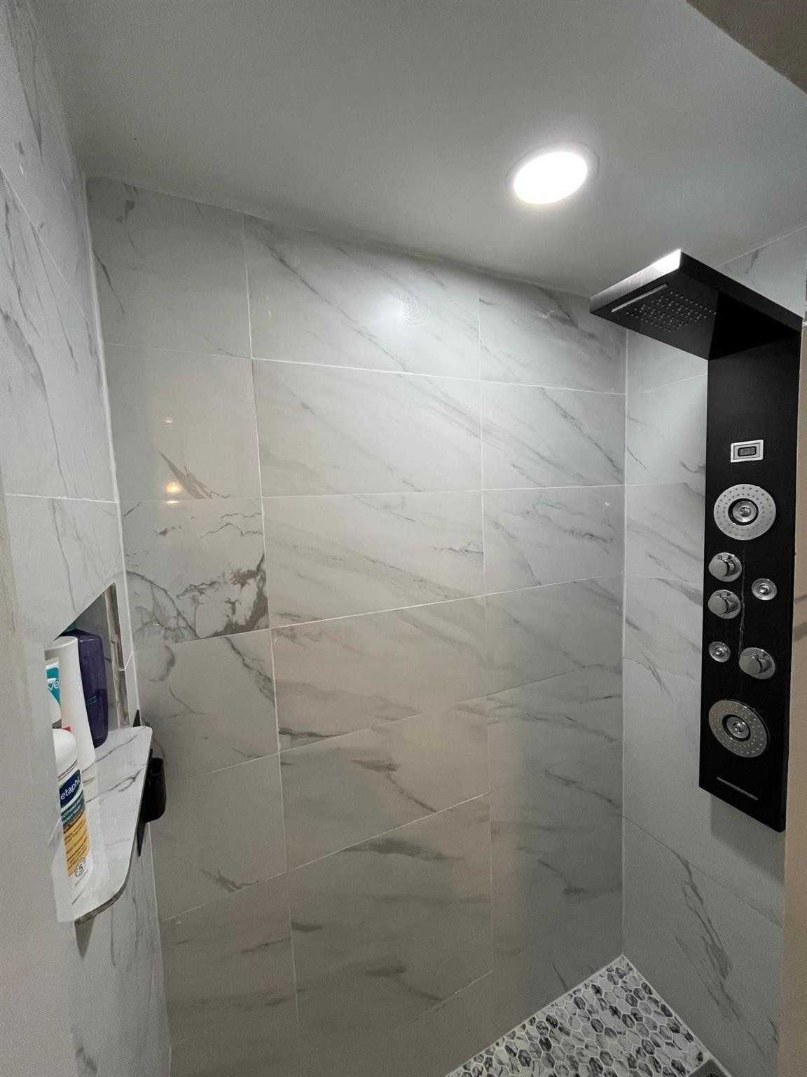 20780 Boca Ridge Drive North, Unit 20780 Boca Raton, FL 33428 - Photo 13 of 35 a bathroom with a shower