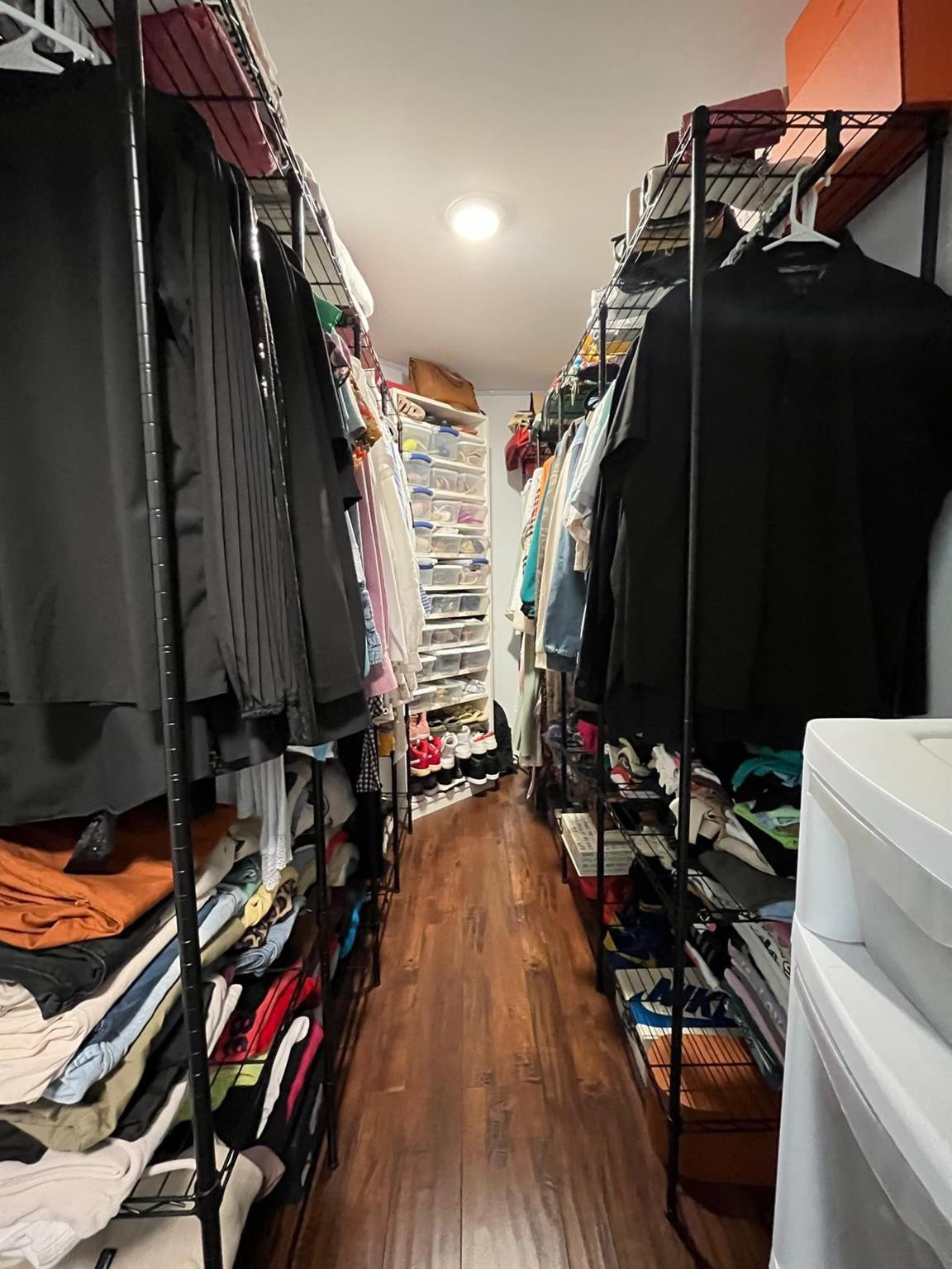 20780 Boca Ridge Drive North, Unit 20780 Boca Raton, FL 33428 - Photo 14 of 35 a view of walk in closet with clothes and shoes
