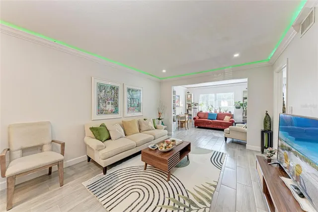 a living room with furniture and a couch