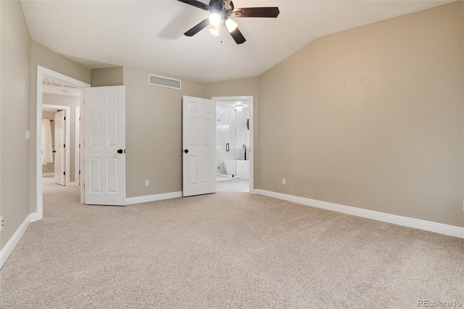 9218 Fox Fire Lane Highlands Ranch, CO 80129 - Photo 23 of 38 an empty room with chandelier fan