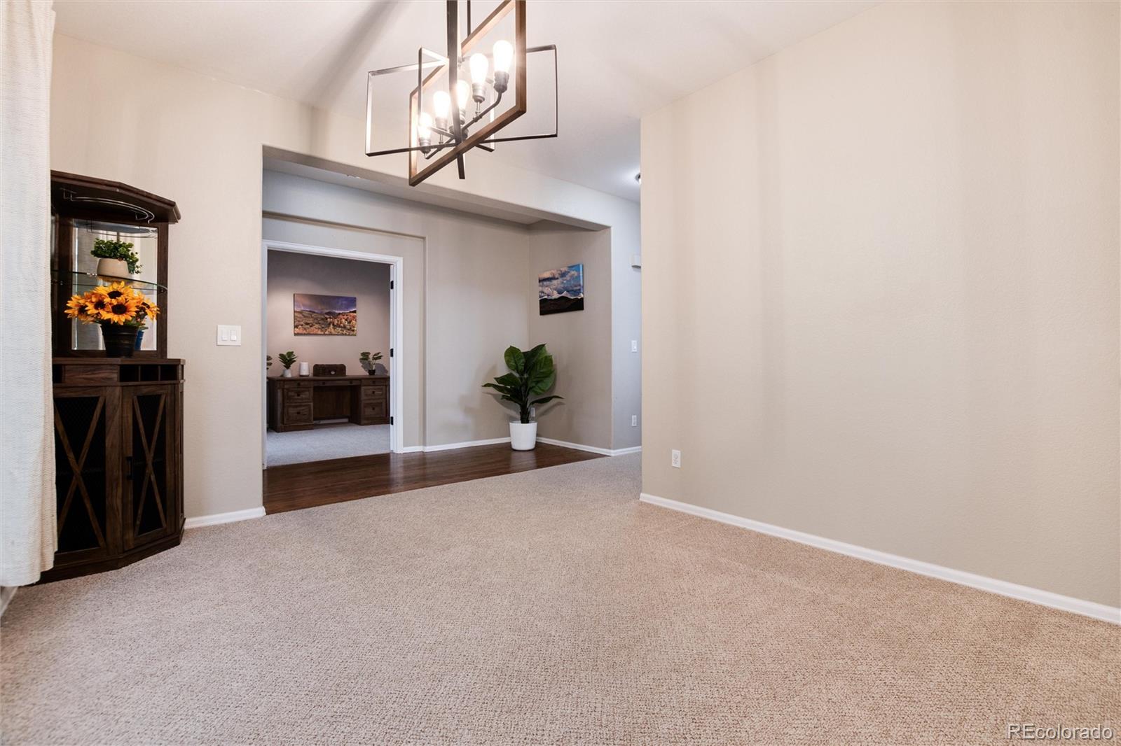 9218 Fox Fire Lane Highlands Ranch, CO 80129 - Photo 6 of 38 a view of a hallway view with staircase