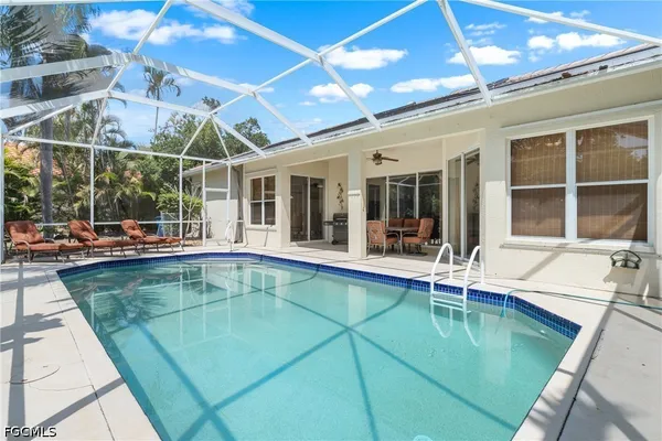 a view of a house with a swimming pool