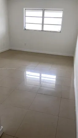 a view of empty room with window