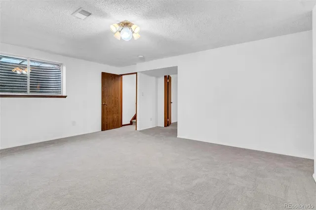 a view of empty room with a window