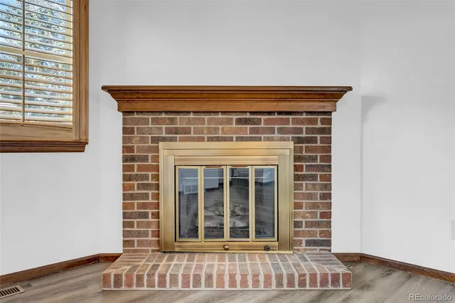 a view of a livingroom with a fireplace