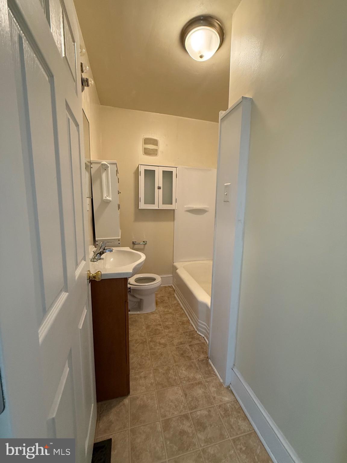 9253 Dahlgren Road King George, VA 22485 - Photo 18 of 23 a view of bathroom with a sink and mirror