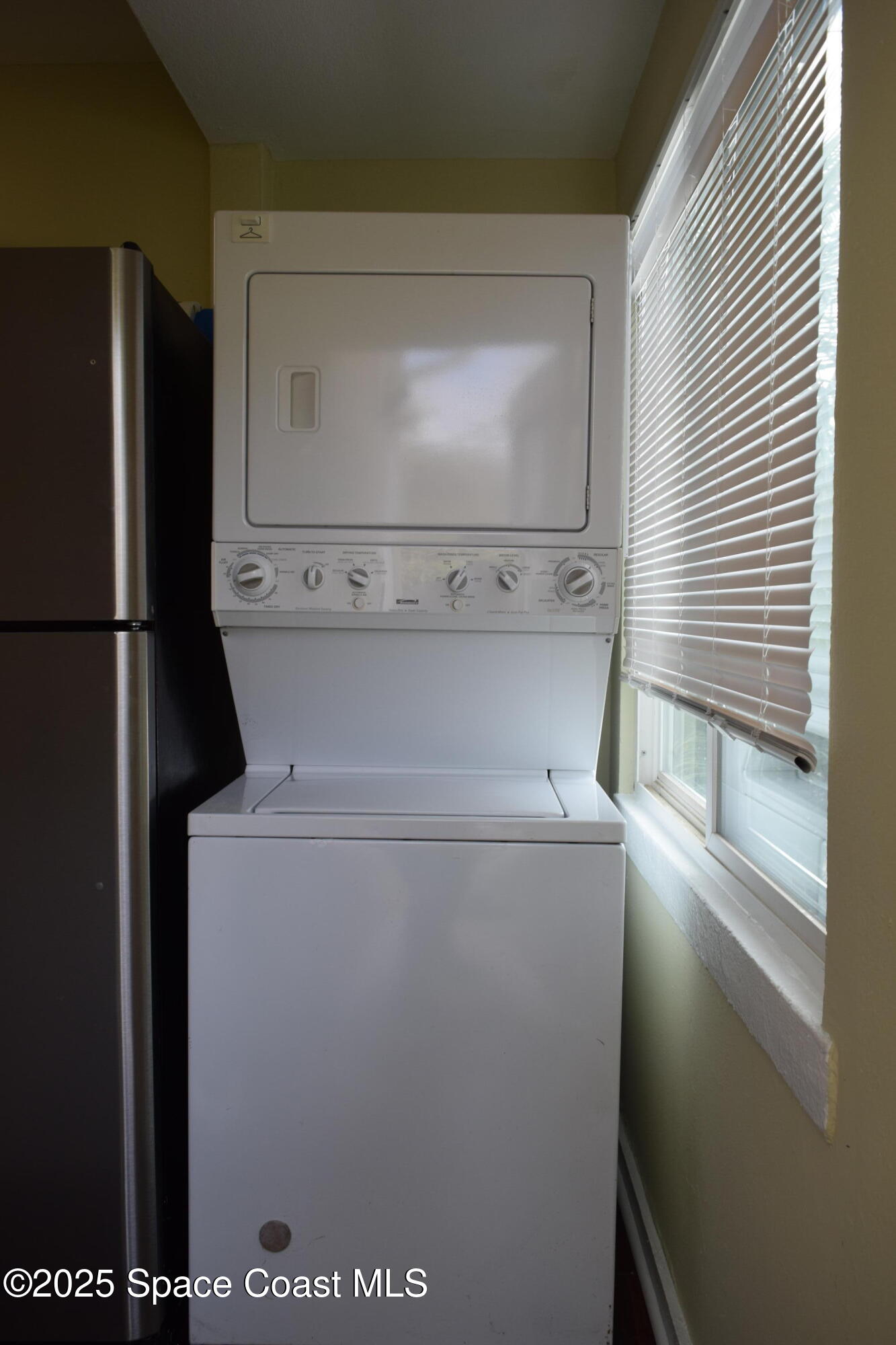 658 Young Street, Unit 2 Melbourne, FL 32935 - Photo 10 of 15 a utility room with dryer and washer