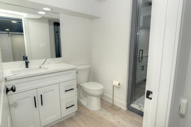 a utility room with sink dryer and washer
