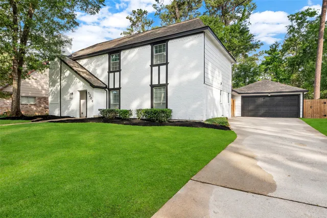 a front view of house with garden