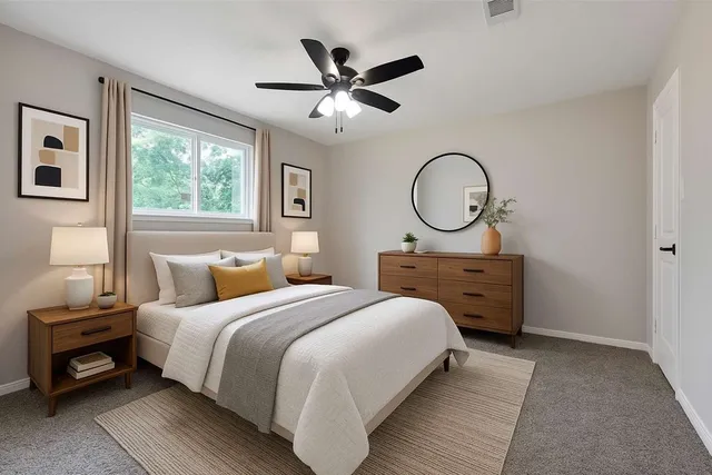 a bedroom with a bed and window