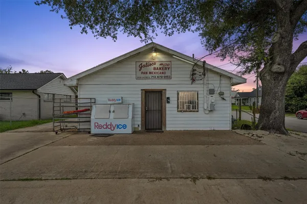 a front view of a house with a garage